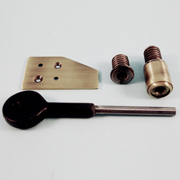 THD255/AB • 19mm • Antique Brass • Surface Sash Stop With Stainless Steel Insert and Extended Key